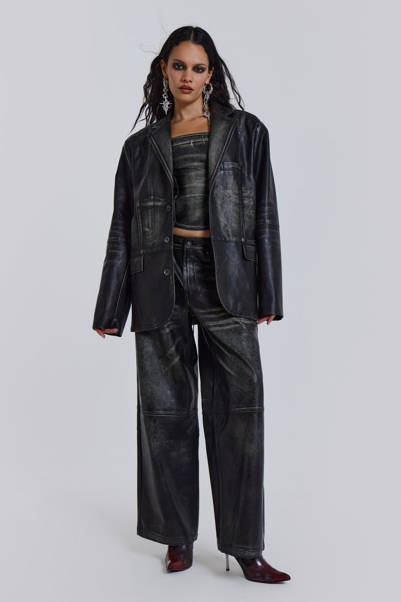 Introducing the Ash Blazer - crafted from a faux leather PU fabric with a unique heavy acid wash finish in an off-black colourway, this oversized fit blazer features a two-button front, jet pockets with flaps on the chest and a back vent, the blazer is fully lined and perfect for layering.