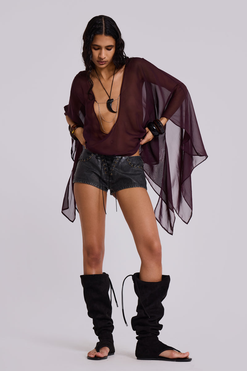 Vaca Whipstitch Faux Leather Mini Shorts in Black